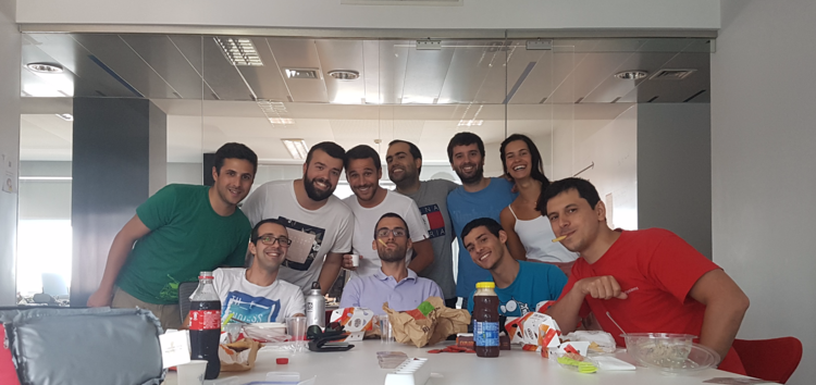 A room full of smiling developers