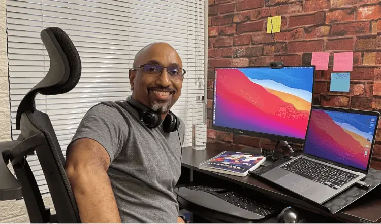 Bejoy sitting at his home desk