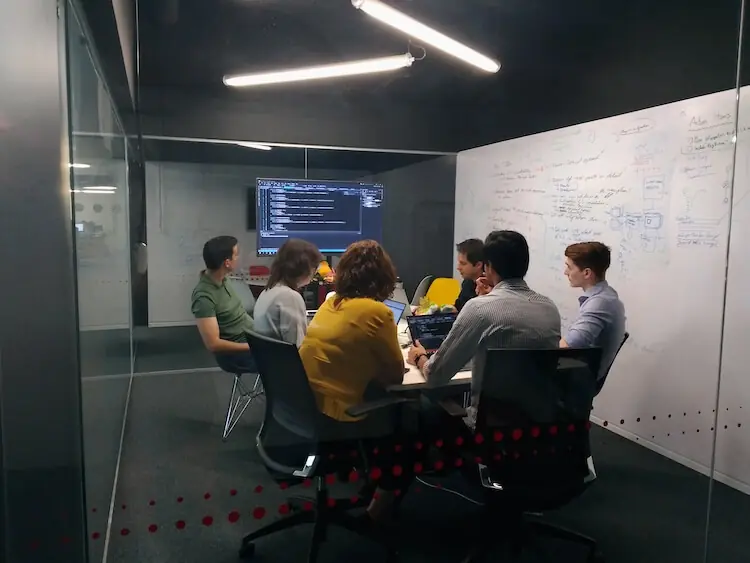 Team brainstorming in a room