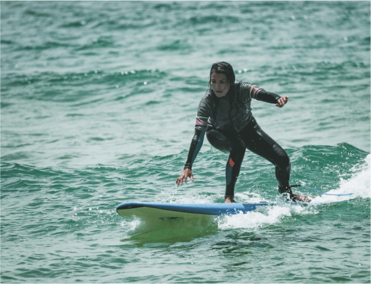 Sara surfing
