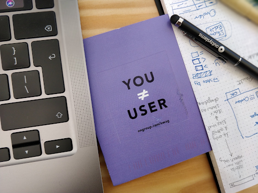A UX mantra written on a sticker: you are not your user.