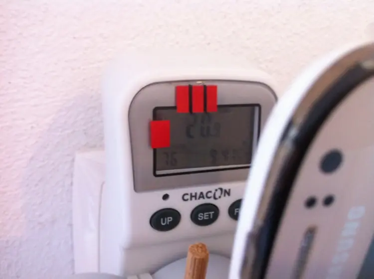 The meter with the duct tape on it